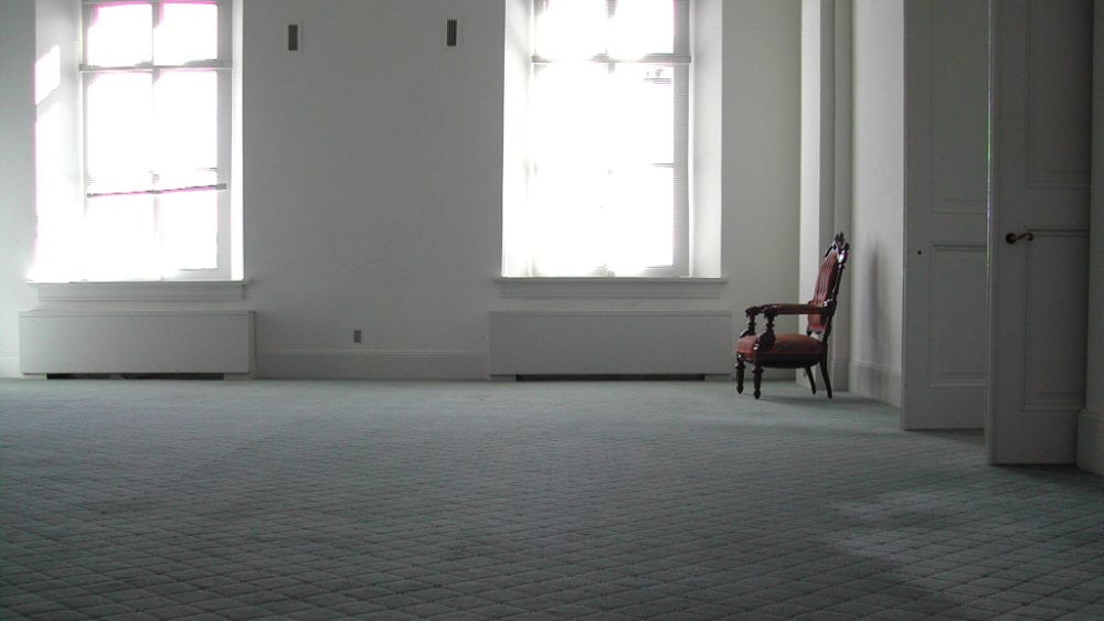 Unoccupied Property Insurance empty room with chair