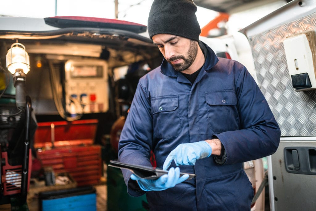 Garage insurance inland marine coverage. Picture of road side assistance auto mechanic with mobile tools and equipment that can be covered by inland marine.