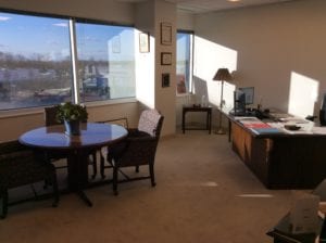 Fairfax, VA insurance agency interior, single office overlooking Fairfax streets.