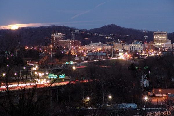 Asheville, NC Insurance Agency, the city lighted at night.