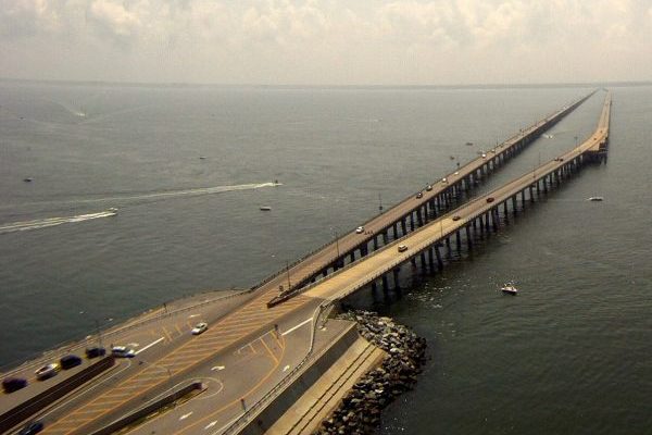 Eastern Shore of Virginia, Chesapeake Bay Bridge Tunnel, aerial view of two bridges merging into a single stone and concrete island at the beginning of the tunnel.
