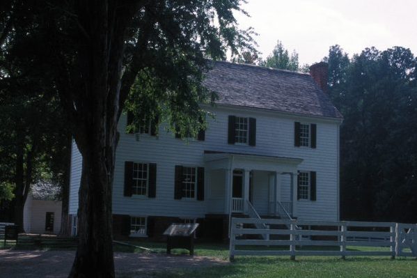 Sutherland, VA Pamplin Historical Park two story white clapboard sided home with cedar shingles.