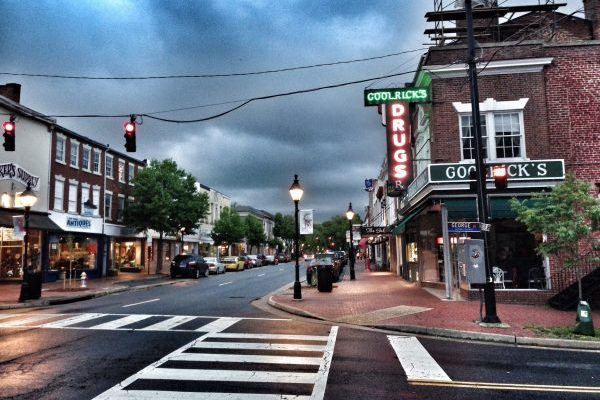 Downtown Fredericksburg, VA shops on street on an overcast day.