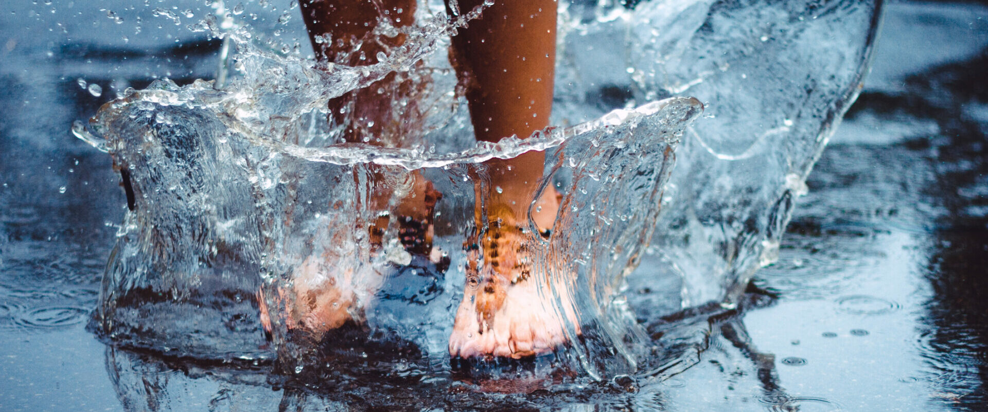 Feet jumping in water.